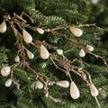 Décorations de Noël sur tige en branches perlées